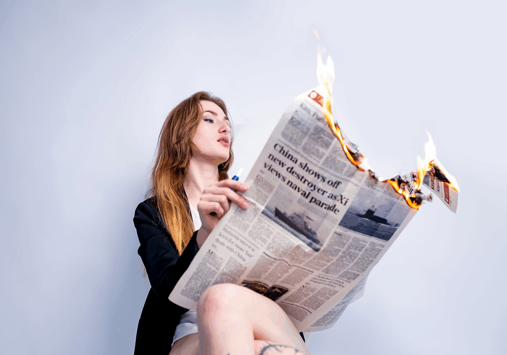 a-stylish-blonde-businesswoman-smoking-and-holding-2025-03-13-00-53-15-utc a-stylish-blonde-businesswoman-smoking-and-holding-2025-03-13-00-53-15-utc