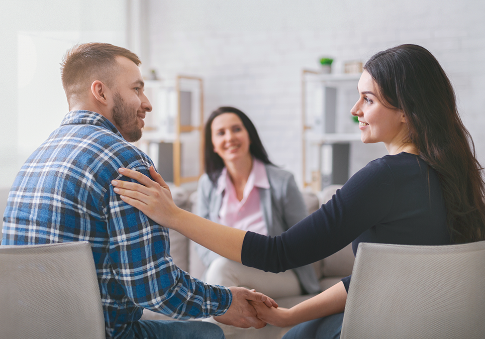 couple-holding-hands-at-therapy-session-2026-01-08-23-23-28-utc